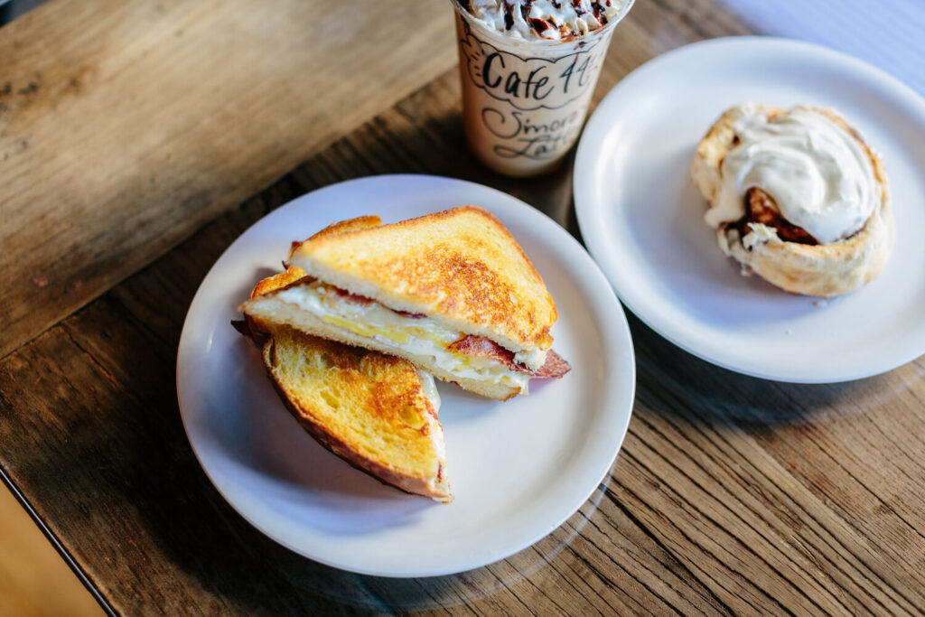 Breakfast sandwich and cinnamon roll at Cafe44 in Greensboro, GA