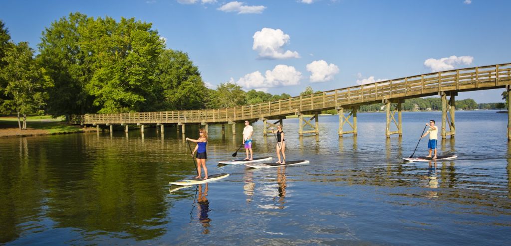 People paddleboarding on Lake Oconee.