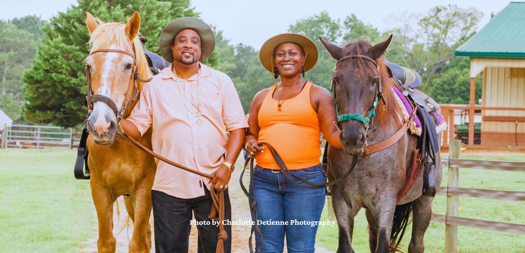Couple with horses at Southern Cross Guest Ranch.